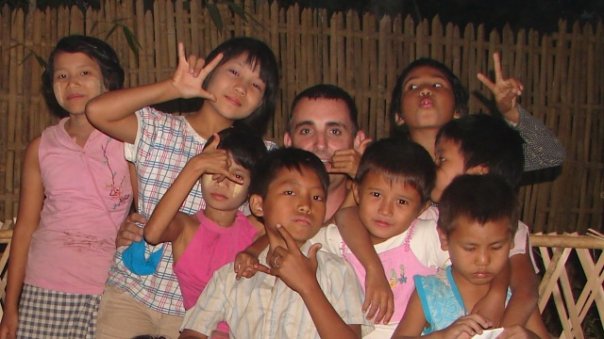 Jonathan with orphans and needy kids