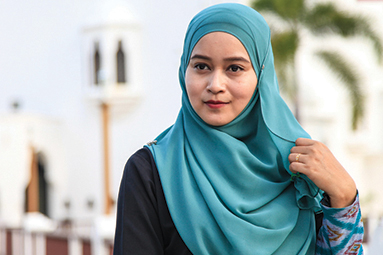 young muslim woman at Mosque in Kuala Terengganu, Malaysia